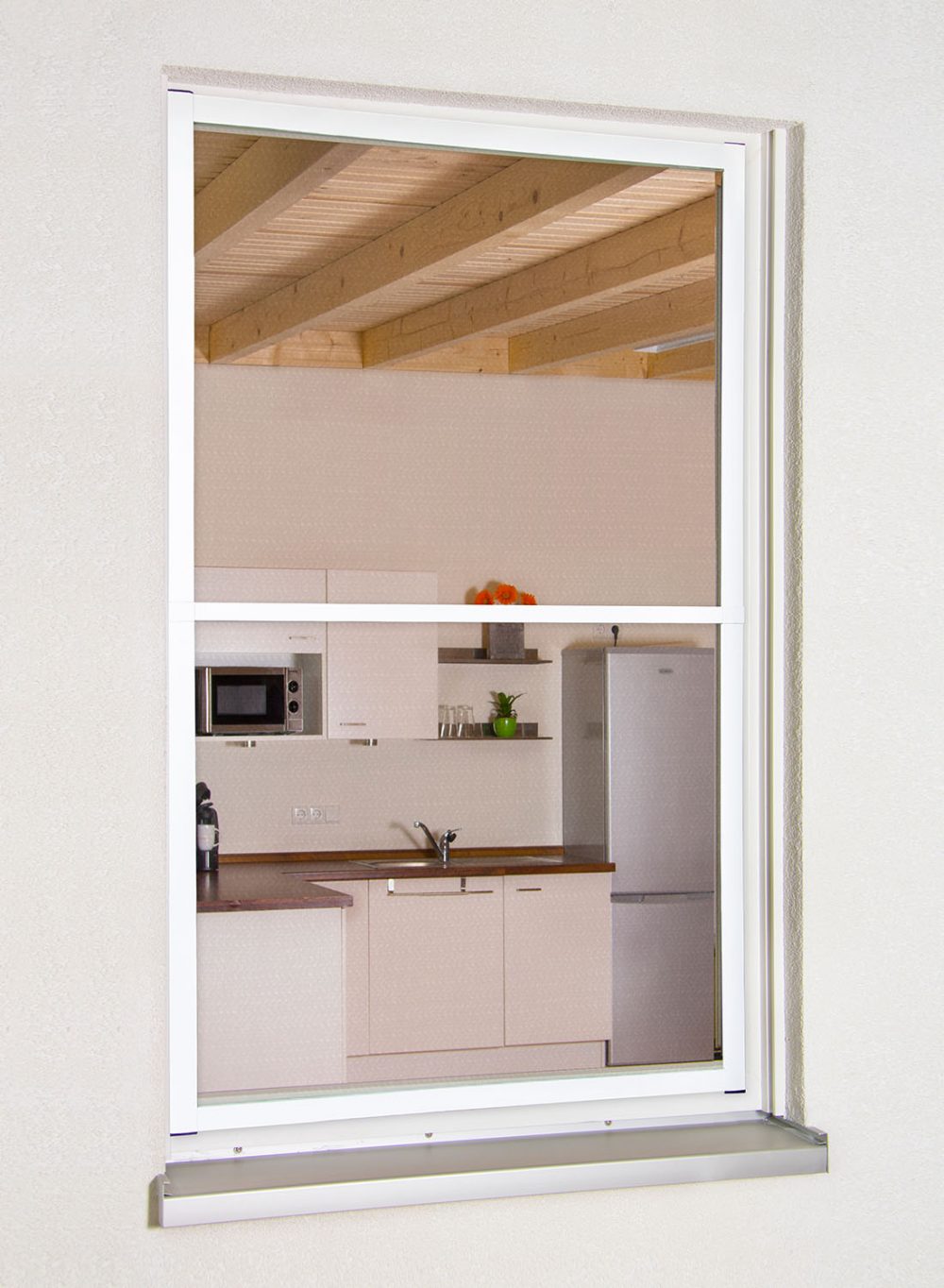 Ansicht des montieren Fensterbausatzes "MASTER SLIM XL" von der Terrasse aus.
